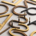 EZRA Zahlen in Antik-Messing