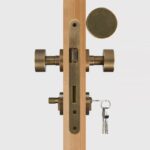 FERN Bouton de porte en laiton massif et cuir - Laiton antique