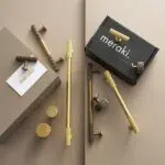 Maniglia a barra zigrinata in ottone OSLO